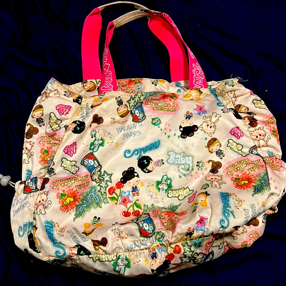 Harajuku lovers large purse. Good condition. Some discoloration on the handles.